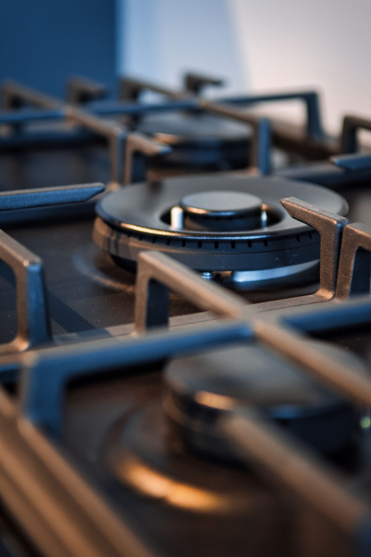 Close view of gas cooktop burners and grates